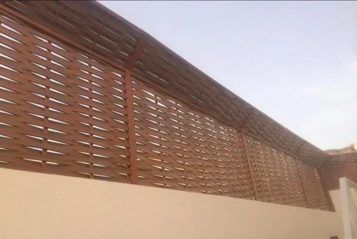 سواتر بديل الخشب في حي ام الحمام الغربي : جمال الخشب ومتانة المستقبل