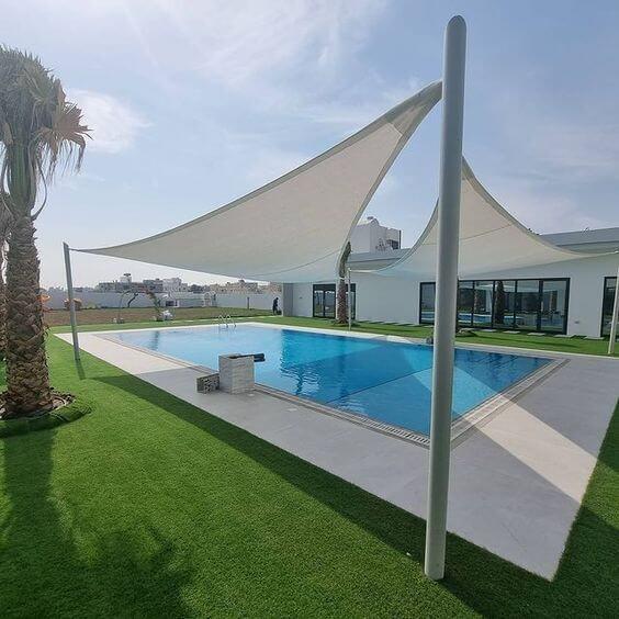 سواتر و مظلات في الرياض  لتغطية المسابح و الفلل و الحواجز الارضية و الاخشاب البلاستيكية