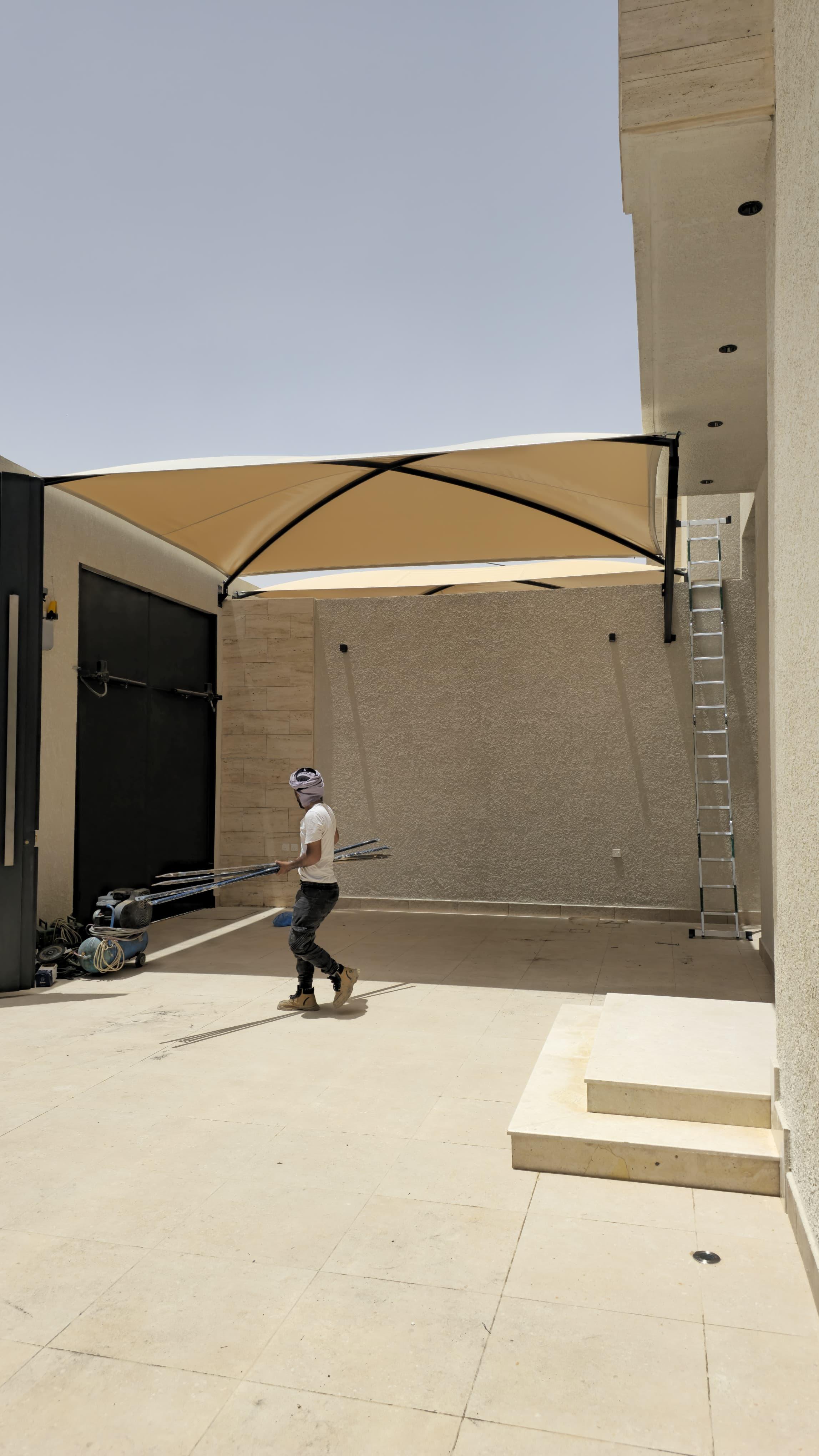 حدادمظلات مواقف سيارات في حي الصحافةوالمزاحمية: دليل شامل لأفضل الأنواع والأسعار لعام 2026