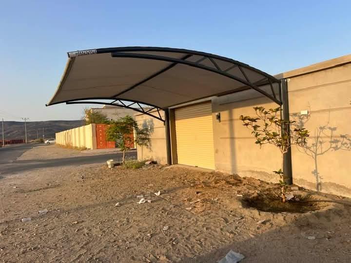 أفضل حداد لتركيب مظلات سيارات في حي حطين وحي الصحافة 2026 | دليل حماية سيارتك من الشمس والحرارة