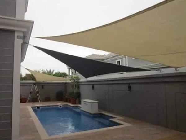 أفضل حداد لتركيب أنواع قماش مظلات خارجية ومظلات شراع حي الياسمين وحي الملقا: دليل الشراء الشامل لعام 2026