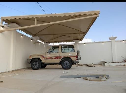 حدادمظلات مواقف سيارات في حي الصحافةوالمزاحمية: دليل شامل لأفضل الأنواع والأسعار لعام 2026