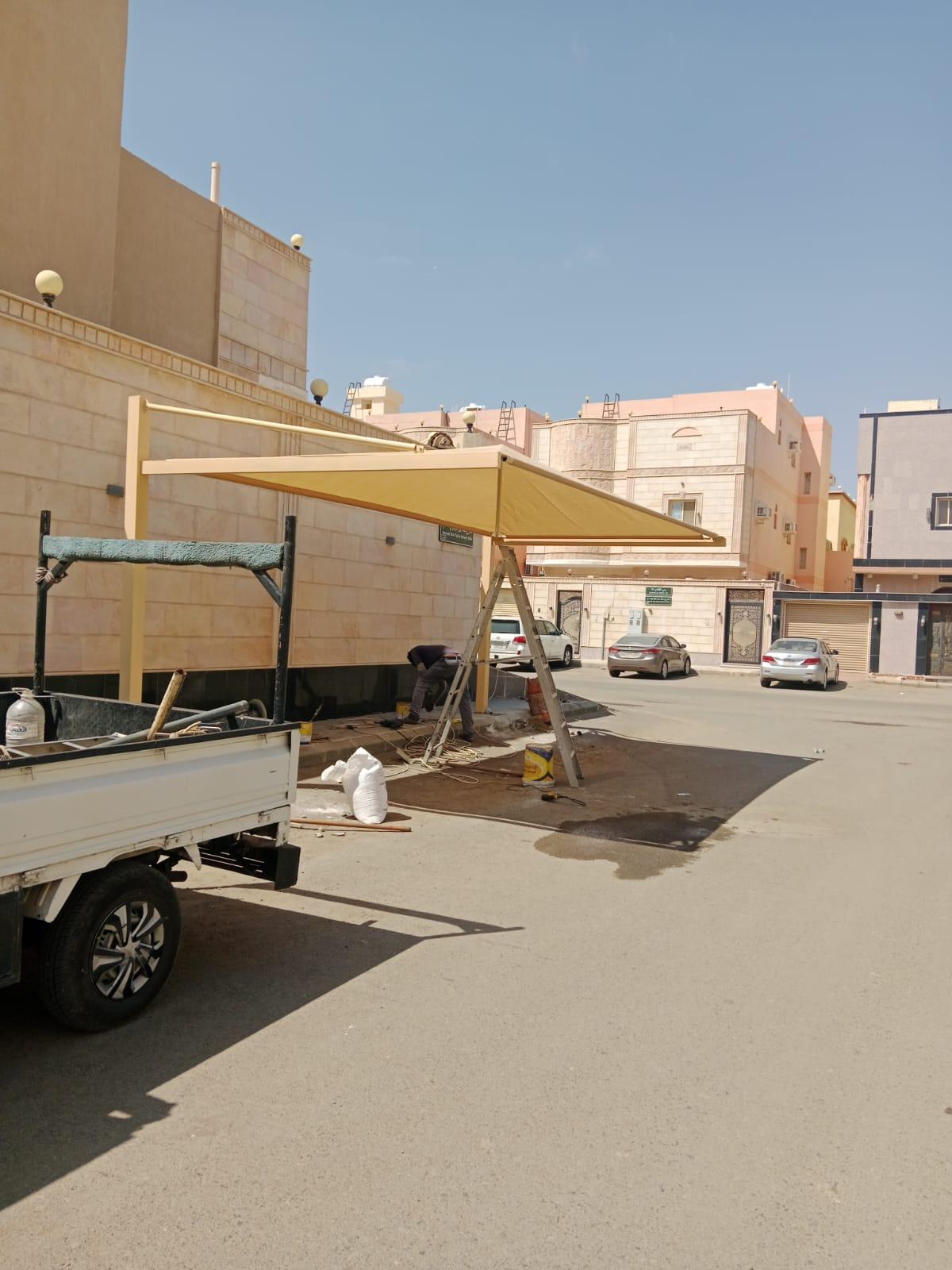 حدادمظلات مواقف سيارات في حي الصحافةوالمزاحمية: دليل شامل لأفضل الأنواع والأسعار لعام 2026